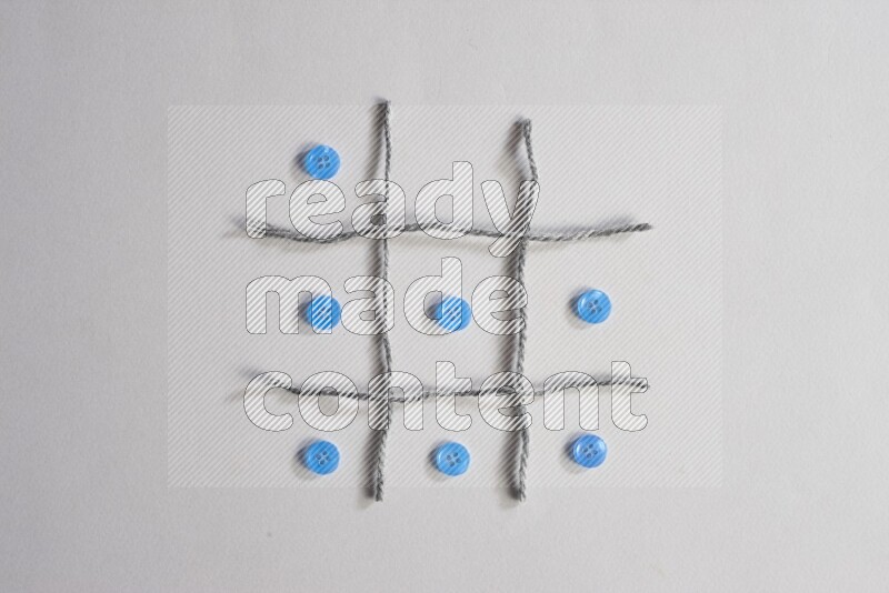 Blue buttons placed on grey background