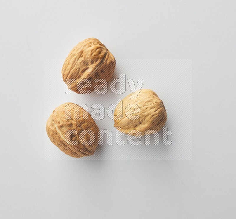 Top-view shot of walnut on white background