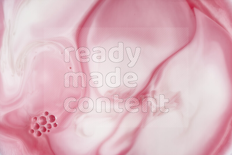 A close-up of abstract swirling patterns in red and white