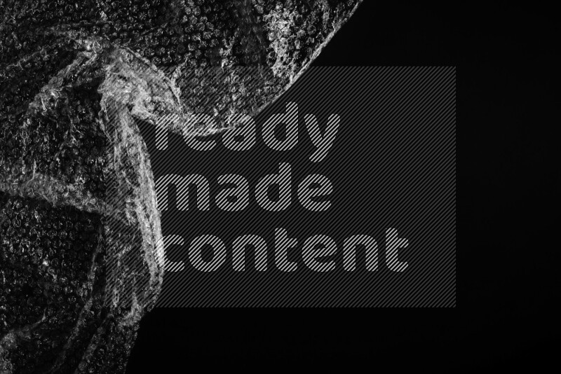 Bubble wrap texture on black background
