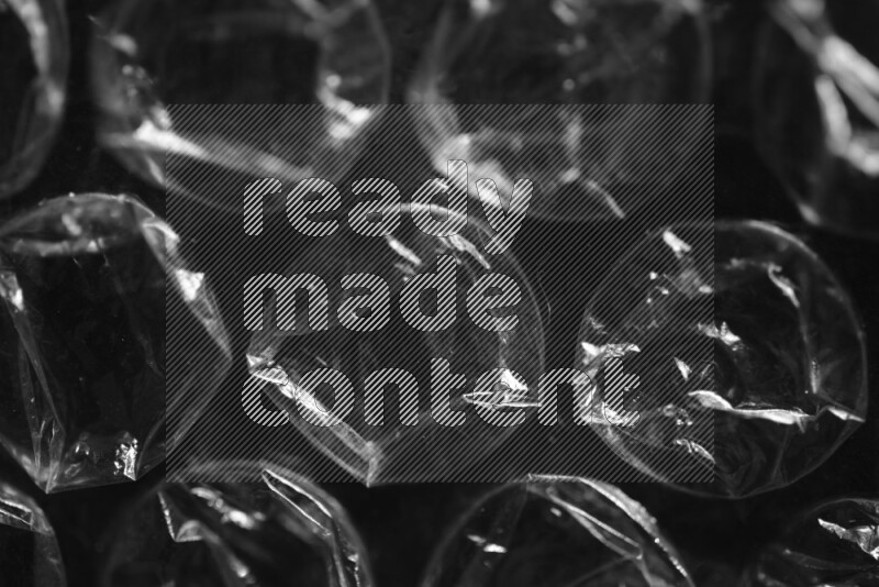 Bubble wrap texture on black background