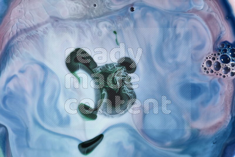 A close-up of abstract swirling patterns in blue, pink and green