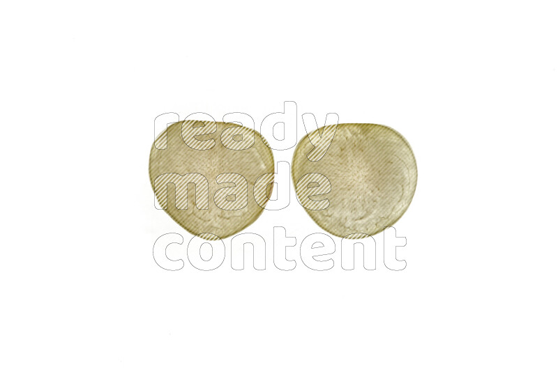Plum slices on illuminated white background