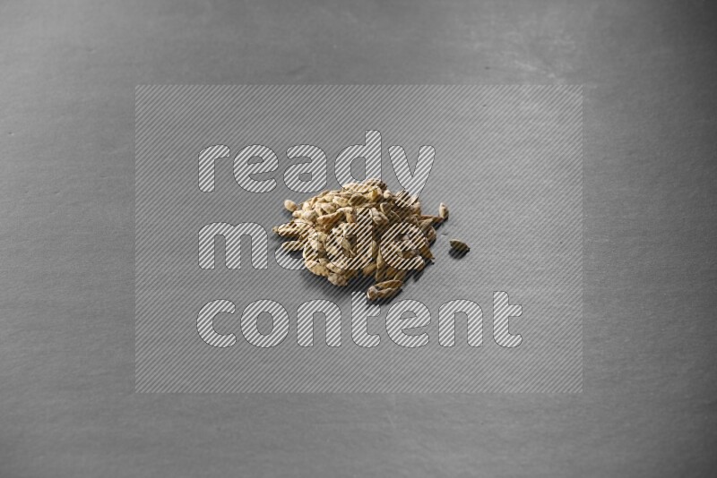Cardamom on a black flooring