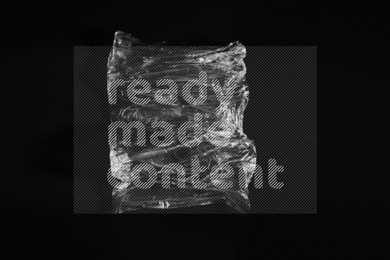 Transparent plastic textures on black background