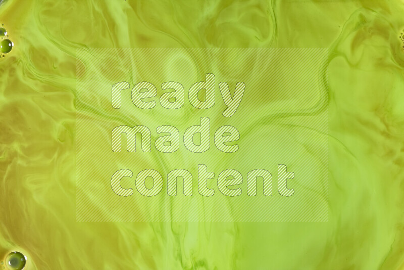 A close-up of abstract swirling patterns in green gradients