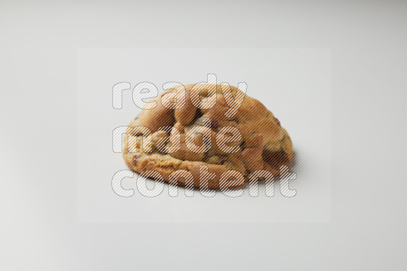 a chocolate chip cookie on a white background
