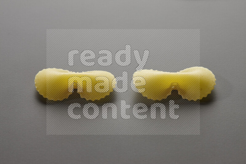 Fiocchi pasta on grey background