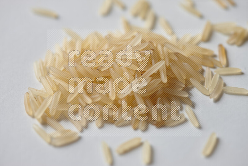 Basmati golden rice on white background