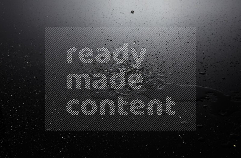 water drops, and droplets on black background