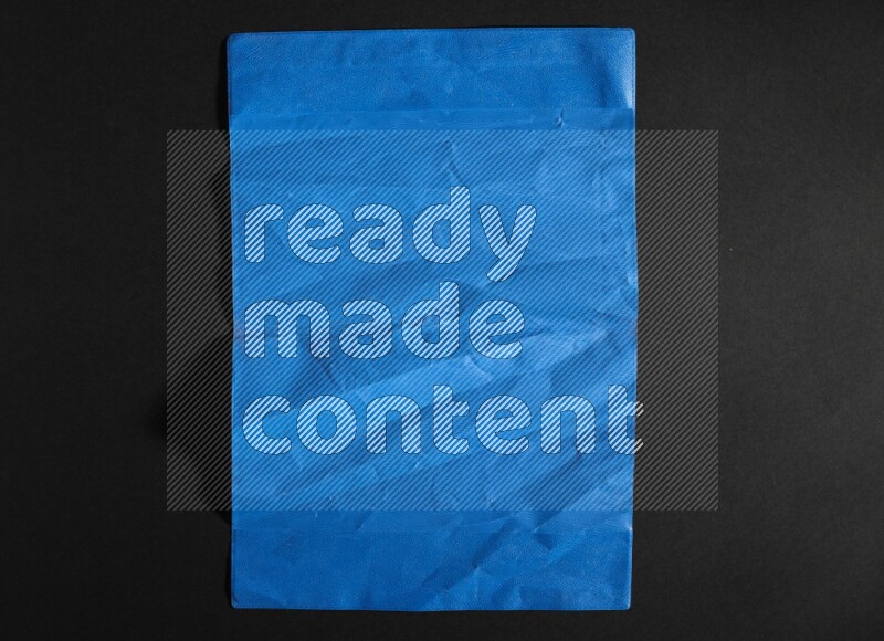 Colored plastic textures on black background