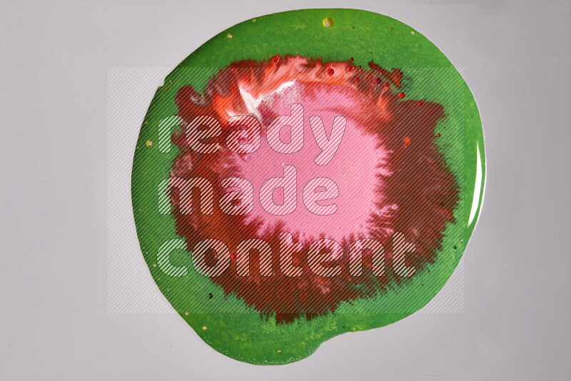 Close-ups of assorted colors blending on a grey background