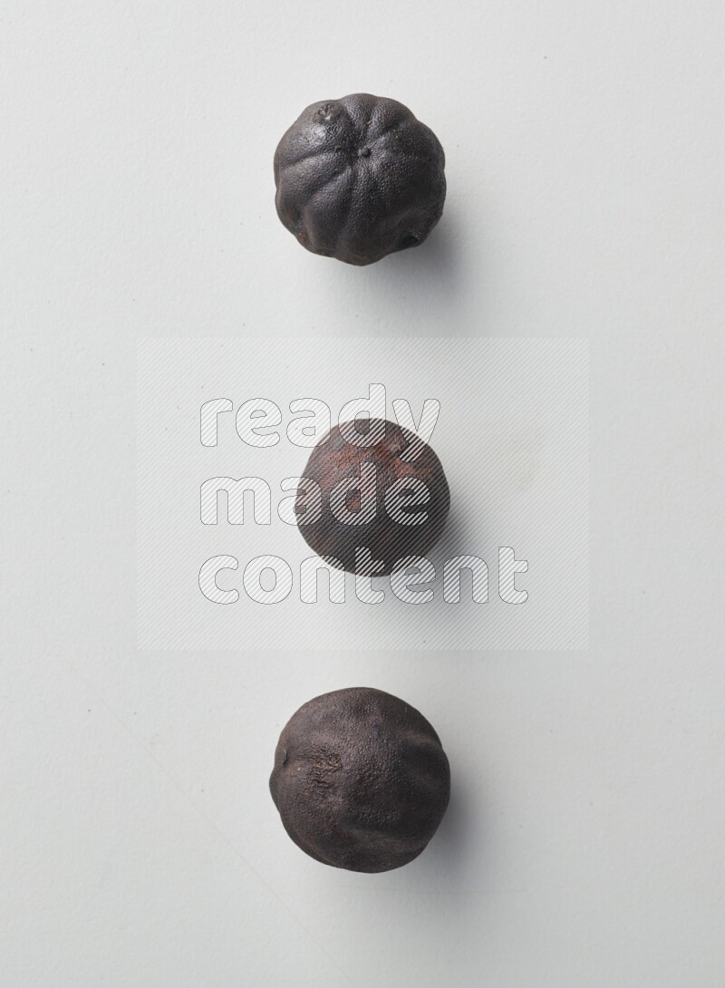 Top-view shot of dried lime (loomi) on white background