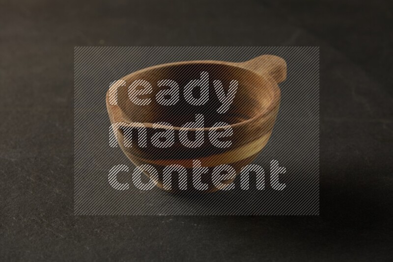 multi color round bowl on grey textured countertop