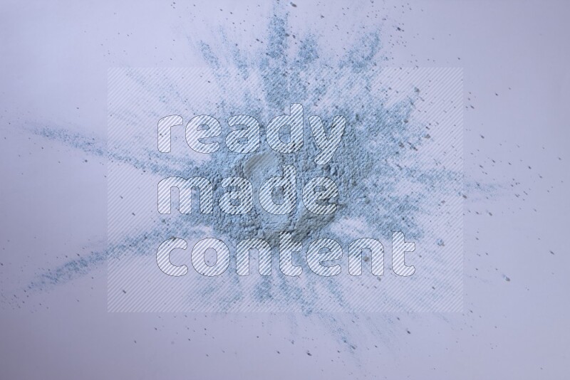 Blue powder on white background