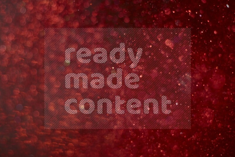 Red glitter powder isolated on black background