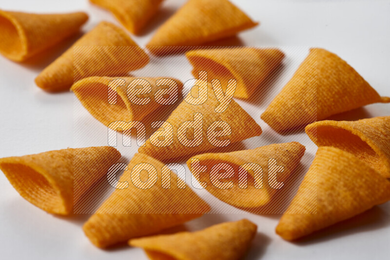 Assorted snacks on white background