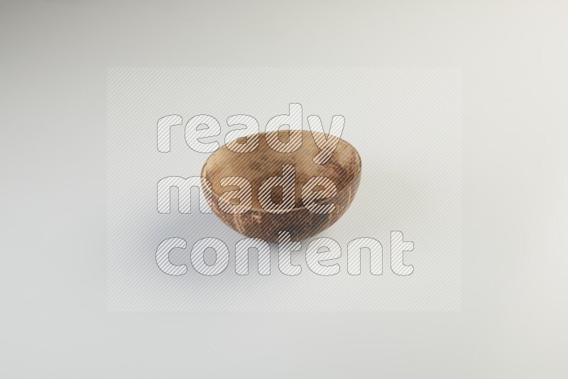 Wooden bowl and plate on white background