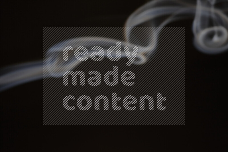 Motion of wavy smoke isolated on dark background