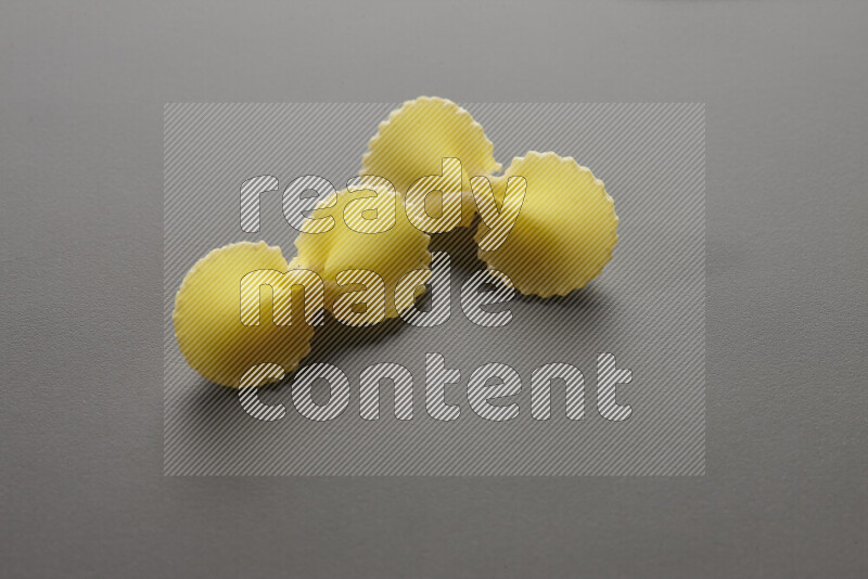 Fiocchi pasta on grey background