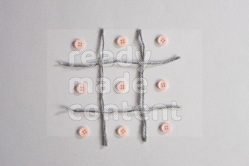 Rose buttons placed on grey background