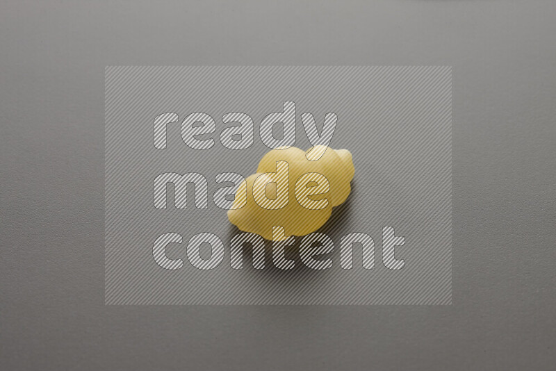 Snails pasta on grey background