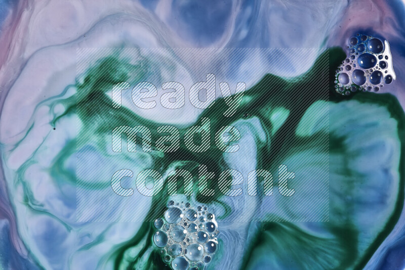 A close-up of abstract swirling patterns in blue, pink and green