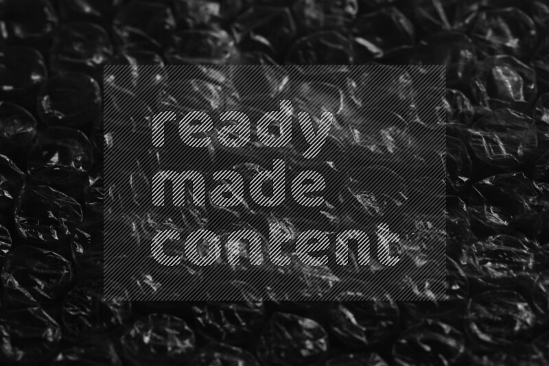 Bubble wrap texture on black background