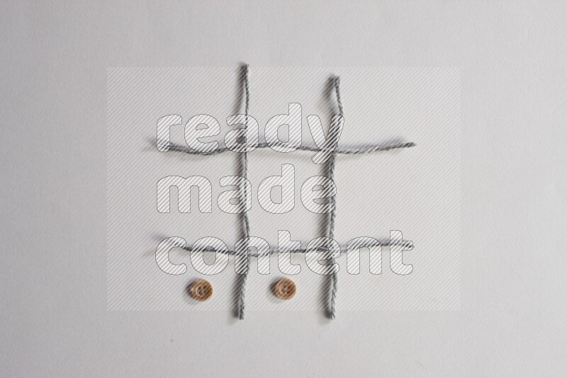 Brown buttons placed on grey background