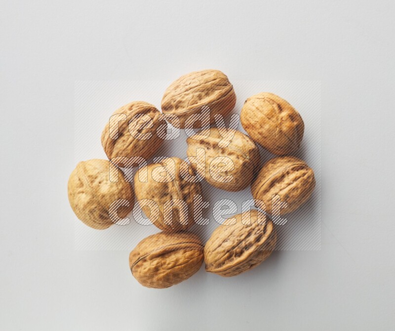 Top-view shot of walnut on white background