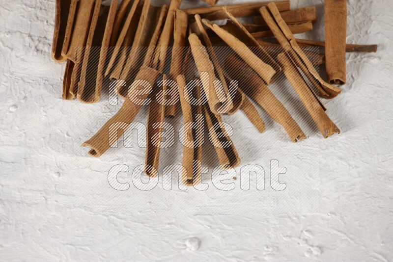 Cinnamon sticks in different angles on white background