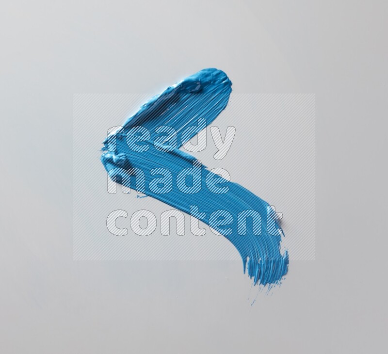 Multi blue straight brush strokes in different shapes on a white background