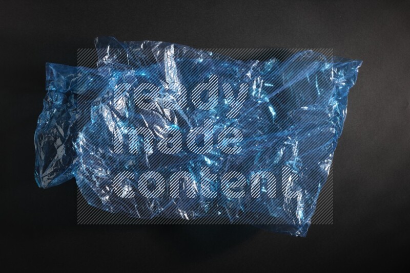 Colored plastic textures on black background