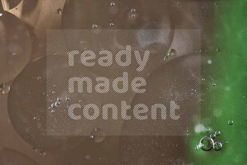 Close-ups of abstract oil bubbles on water surface in shades of green and brown