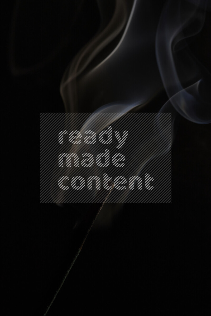 Motion of wavy smoke isolated on dark background