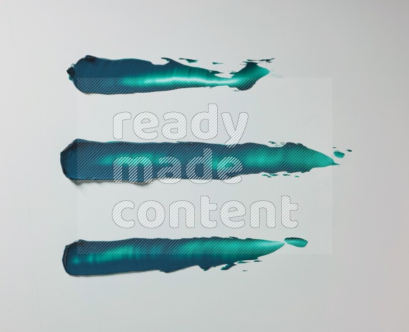 Turquoise painting knife strokes on white background