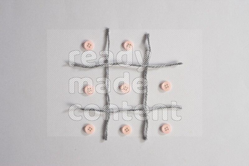 Rose buttons placed on grey background