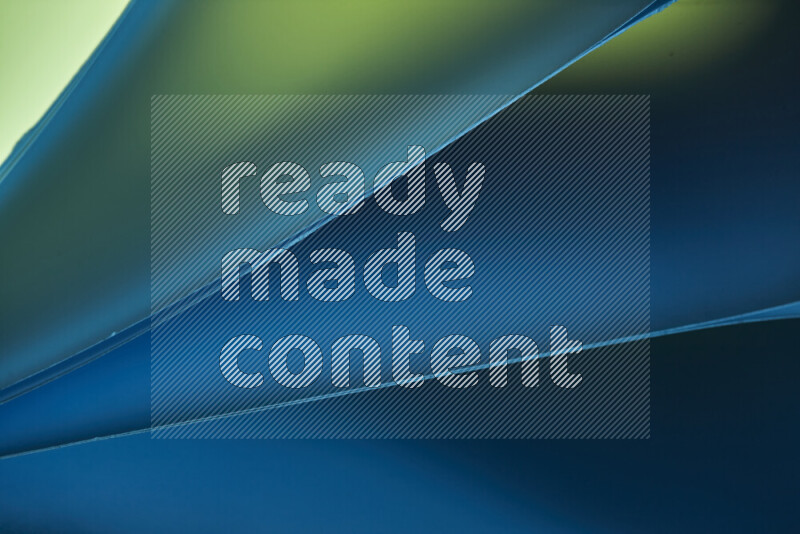 An abstract art piece displaying smooth curves in cold gradients created by colored light