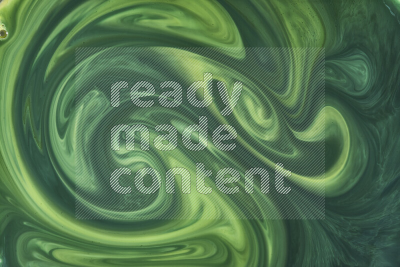 A close-up of abstract swirling patterns in green gradients