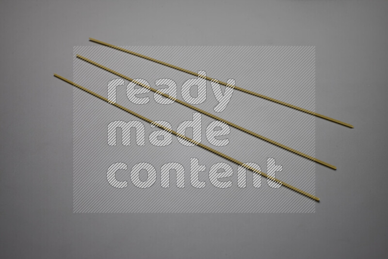 Spaghetti pasta on grey background