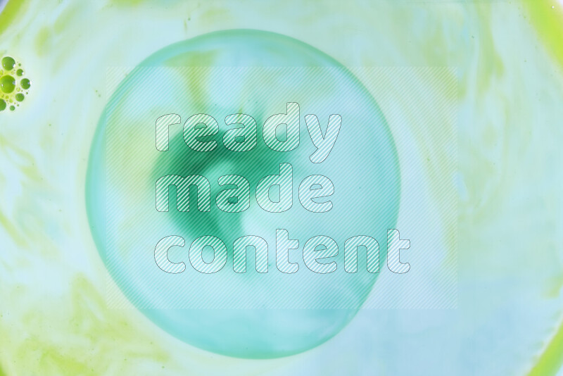 A close-up of abstract swirling patterns in green gradients