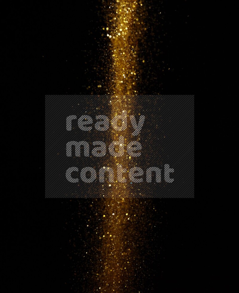 Gold glitter powder isolated on black background
