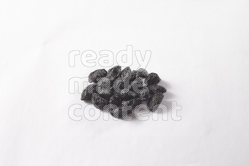 Dried plums on white background