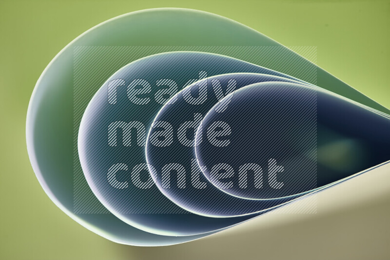 An abstract art of paper folded into smooth curves in green gradients