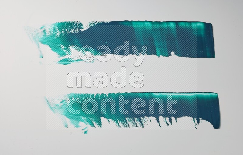 Turquoise painting knife strokes on white background