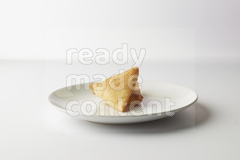 sambosas on a white background