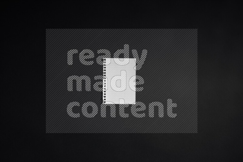 Notebook sheet on black background