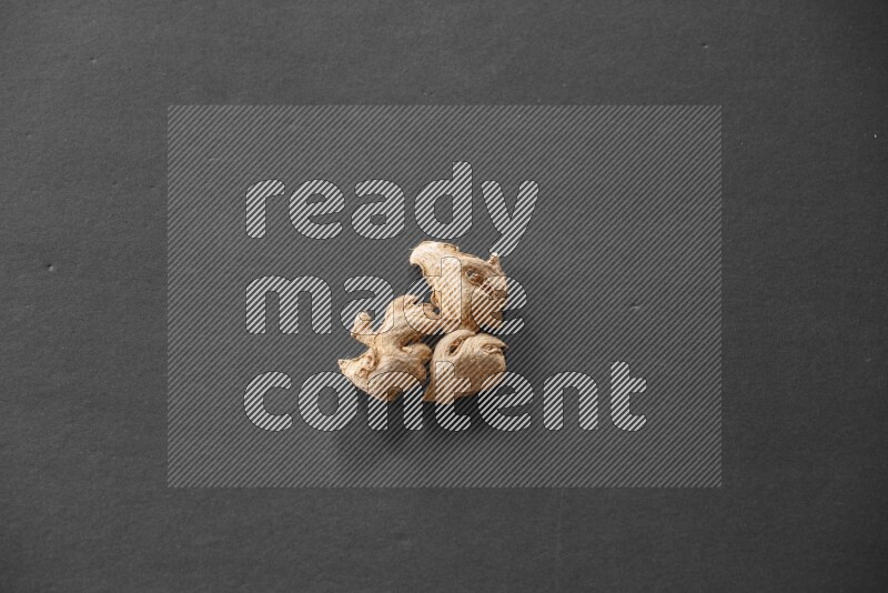 Ginger on a black flooring