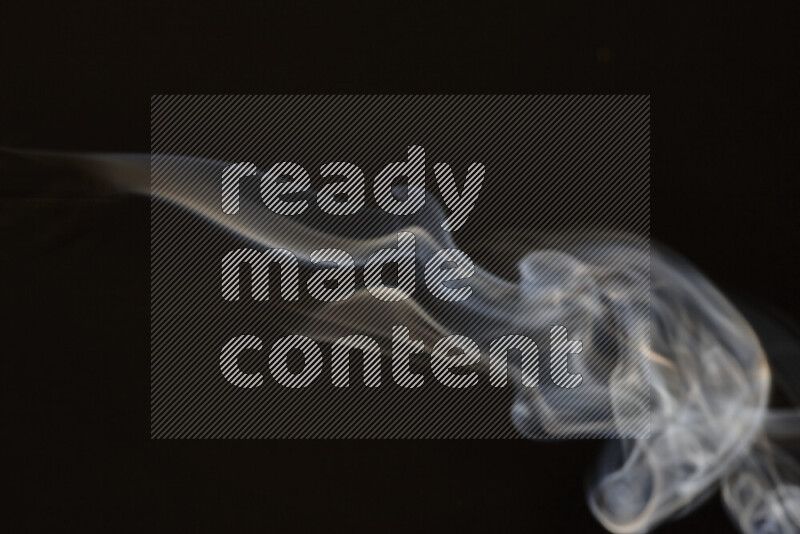 Motion of wavy smoke isolated on dark background
