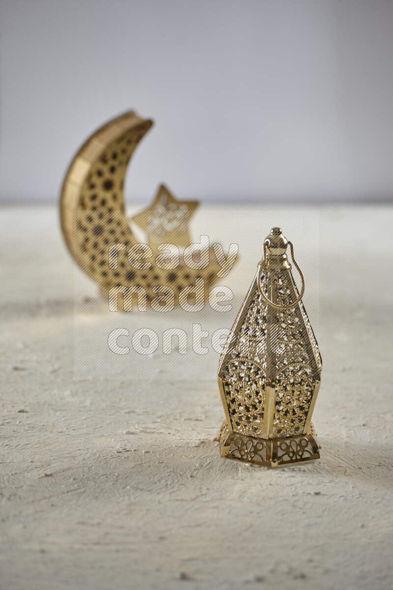 A crescent lantern with classic lantern on textured white background